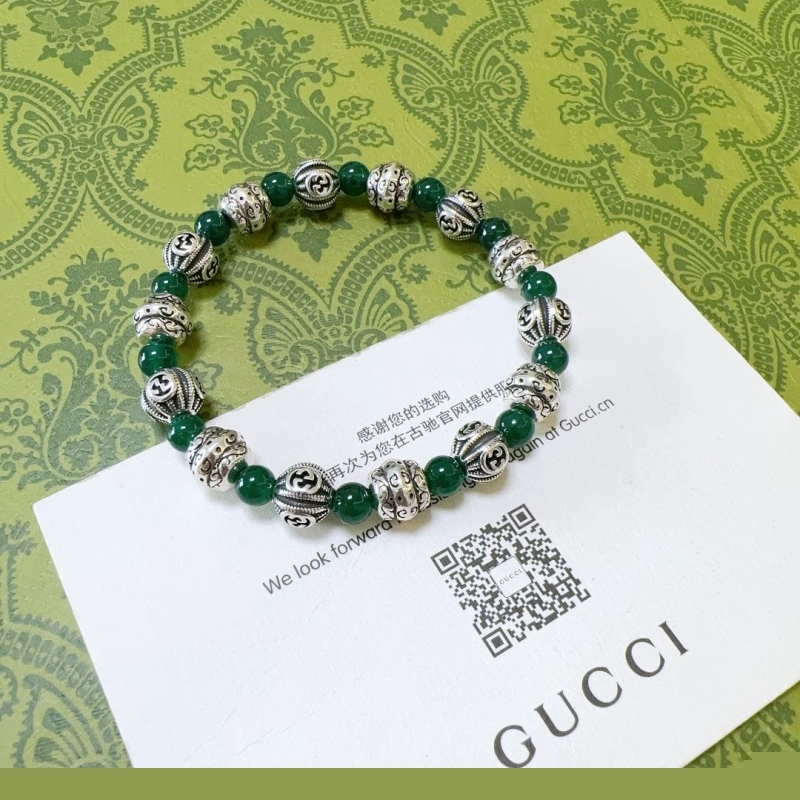 G*u*i bracelets
